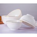 Super white porcelain rice bowls with gold rim.